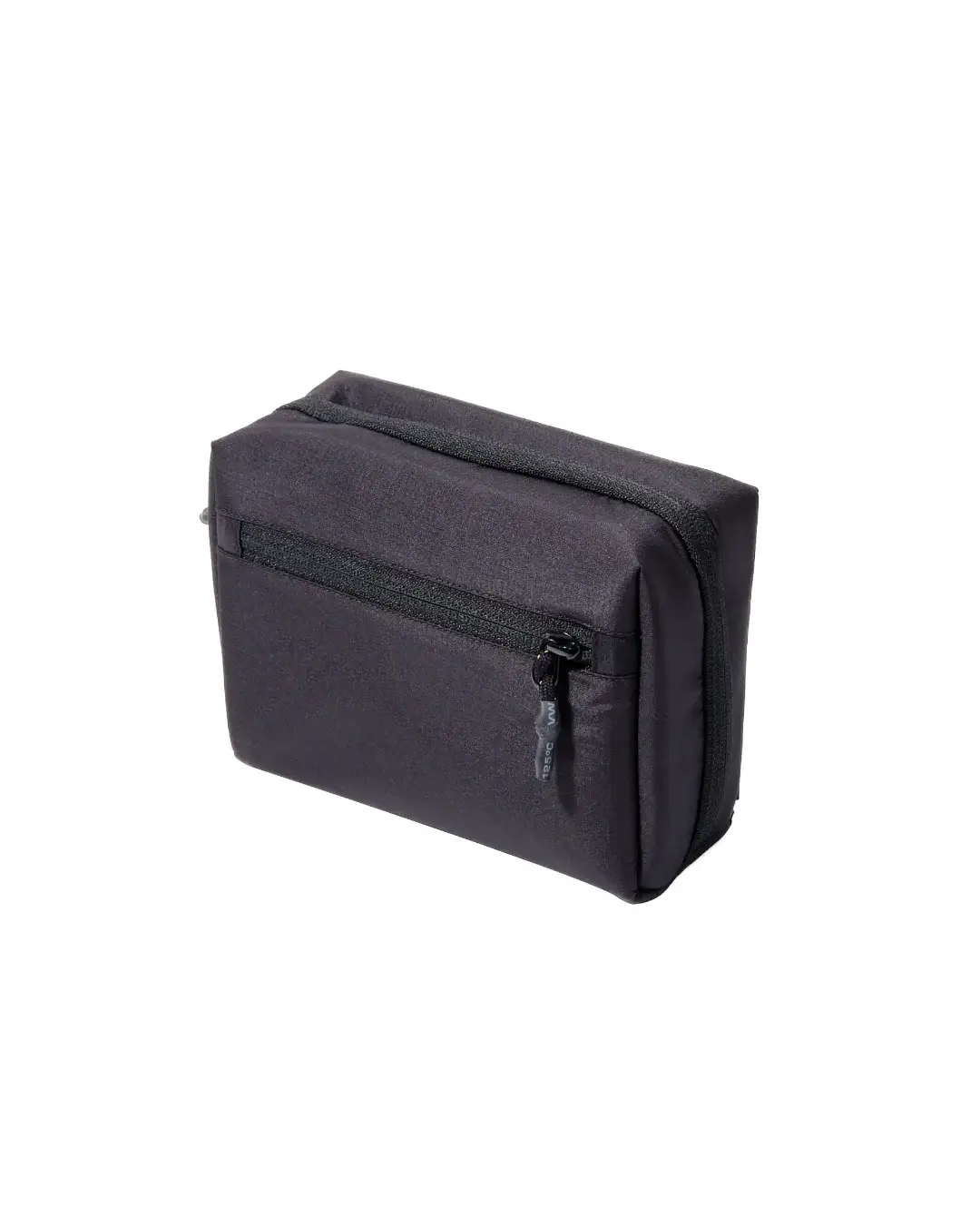 Angled exterior view of the black SYMA ARK travel tech organizer closed, highlighting its structured shape and front zipper pocket