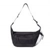 Straight front view of the black SYMA Drone highlighting its spacious main body, quick-access front zippered pocket, and side mesh detail. Urban sling bag.