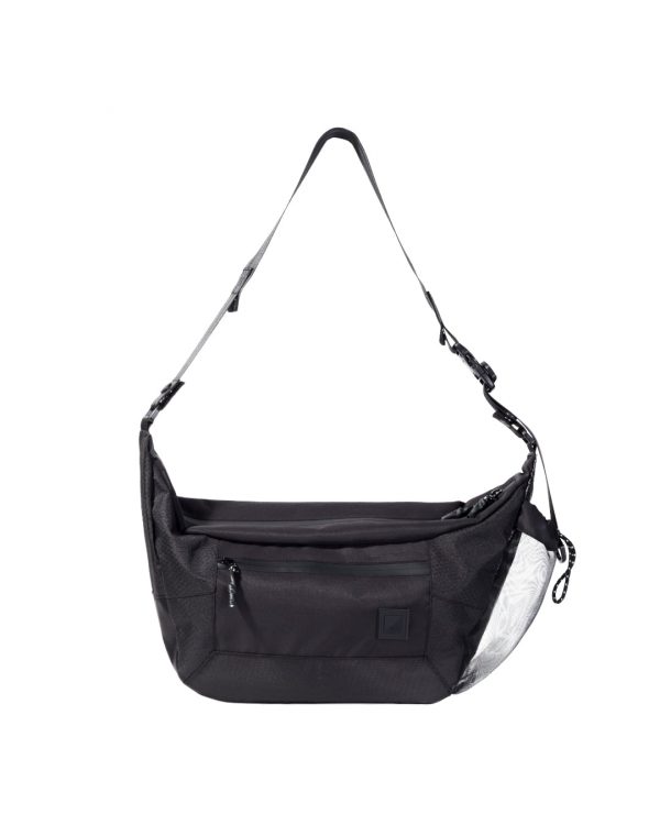 Straight front view of the black SYMA Drone highlighting its spacious main body, quick-access front zippered pocket, and side mesh detail. Urban sling bag.