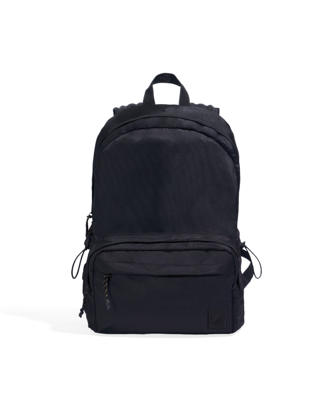 Straight front view of the black SYMA Foyer highlighting its clean utilitarian silhouette, large main compartment, and heavy-duty nylon exterior. 16 inch commuter backpack.