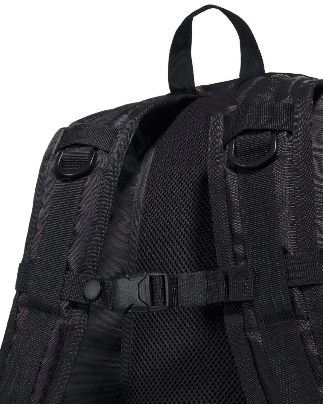 Close-up rear view of the black SYMA Foyer highlighting its breathable mesh back panel, tactical D-rings, and adjustable chest strap buckle. 16 inch commuter backpack.
