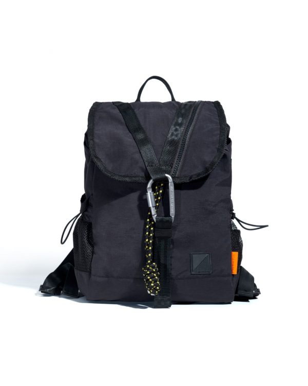 Front view of black SYMA Adore Backpack highlighting V-shaped webbing and tactical carabiner. Compact everyday backpack