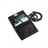 Top-down open view of the black SYMA Arrival compact travel wallet displaying organized interior slots with credit cards, a passport, an Airtag in the top mesh pocket, and attached paracord strap