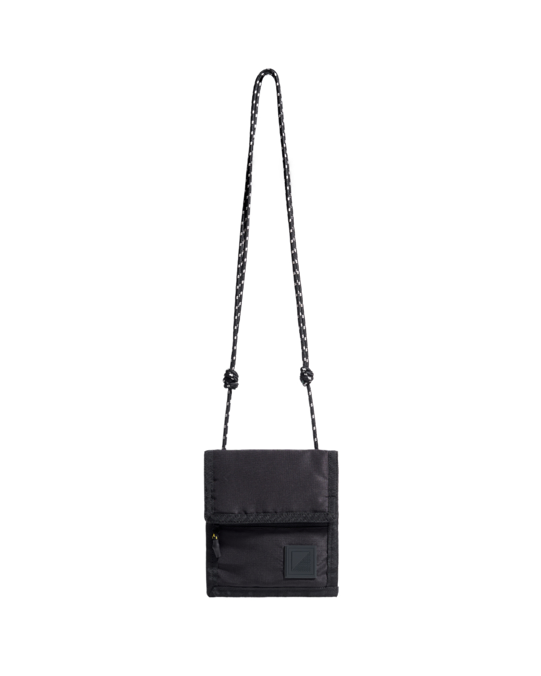 Front vertical view of the closed black SYMA Arrival compact travel wallet suspended by its paracord strap, displaying the ripstop exterior and front zippered coin pocket