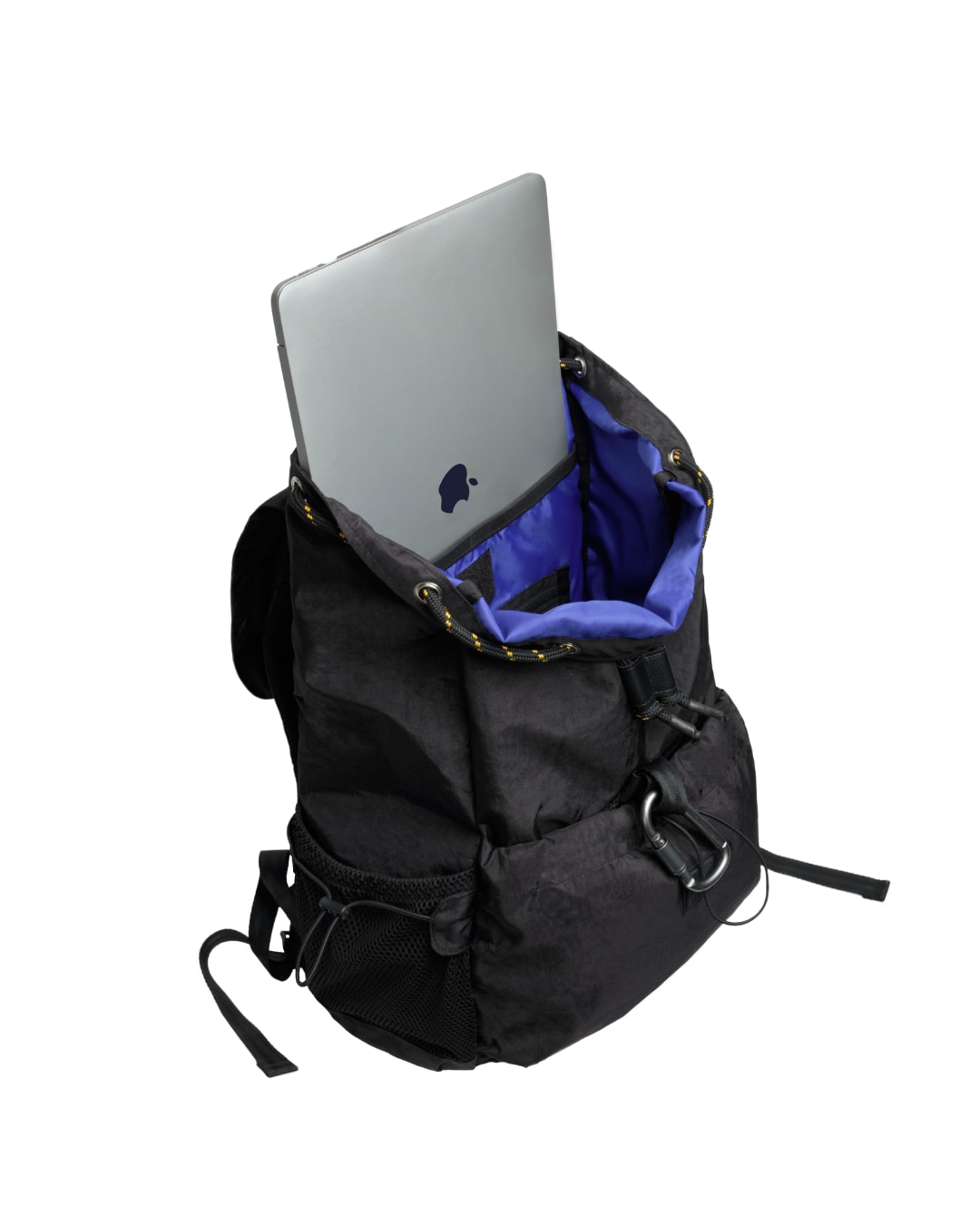 Interior open view of black SYMA Outrun Backpack showing laptop fitting into contrast blue sleeve. Versatile everyday backpack