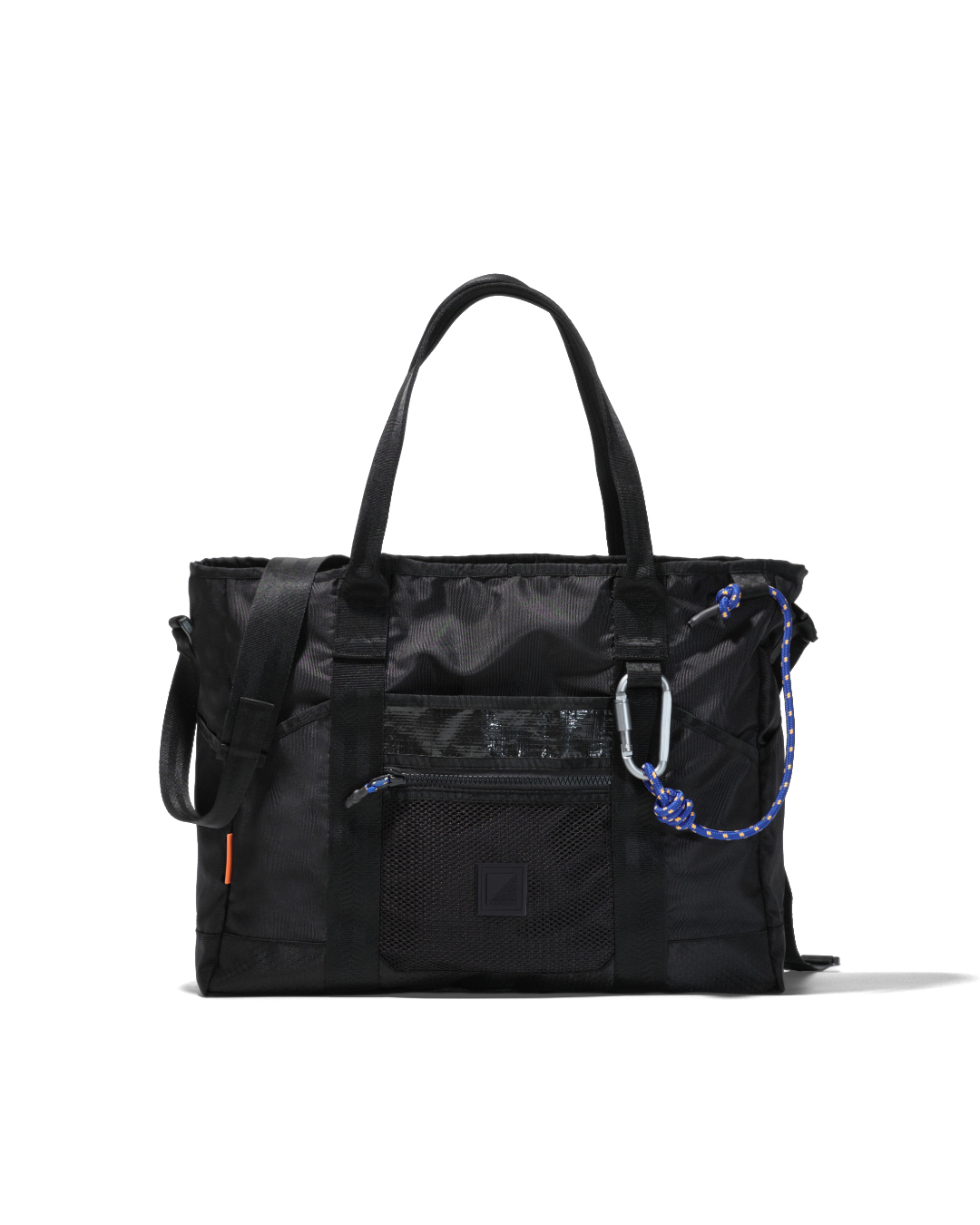 Front view of black SYMA Miles Tote Bag highlighting front mesh pocket and tactical carabiner with blue paracord. Versatile work tote bag