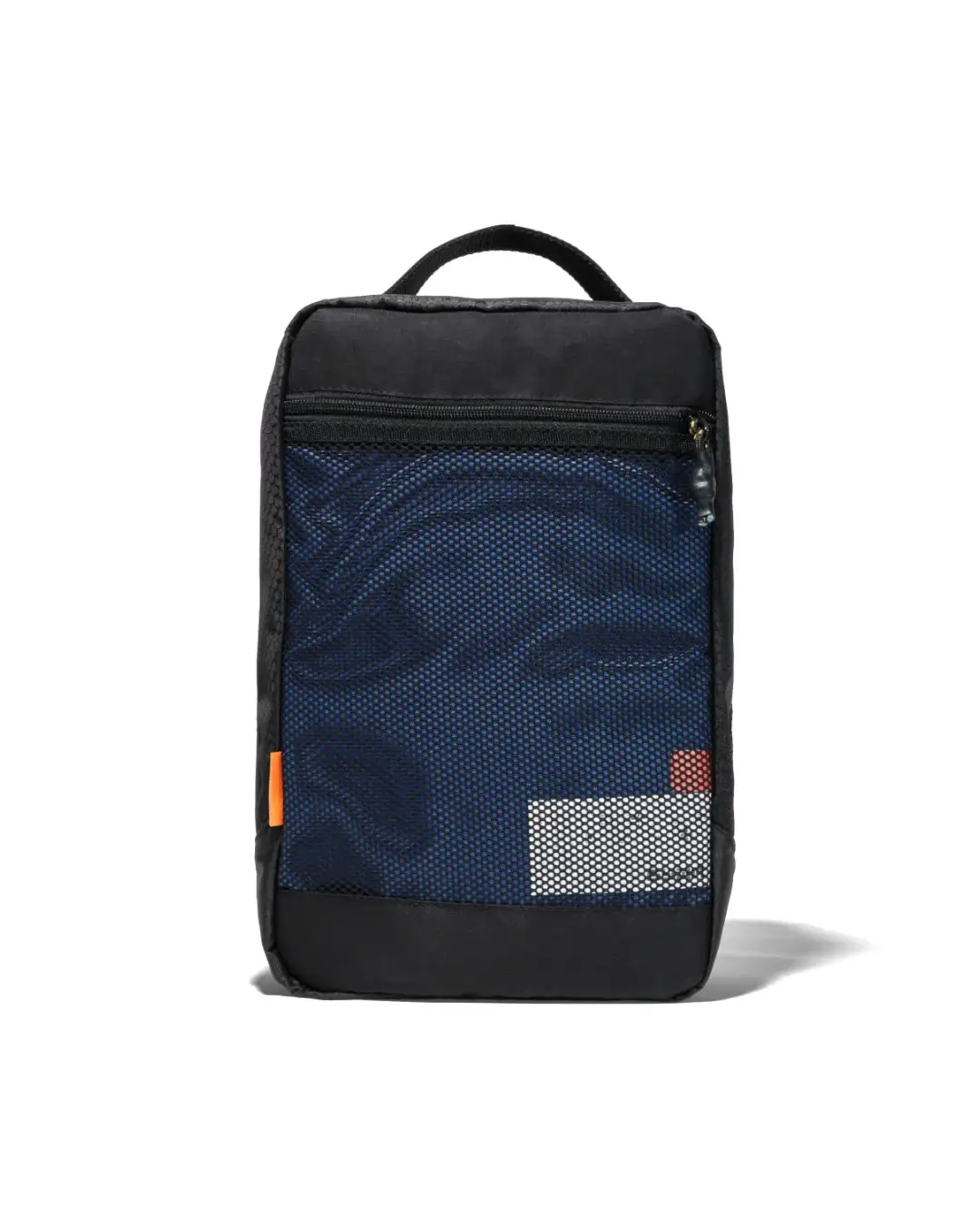 Straight rear view of black SYMA Cubic highlighting its large zippered back mesh pocket for extra storage. Ventilated travel shoe bag.