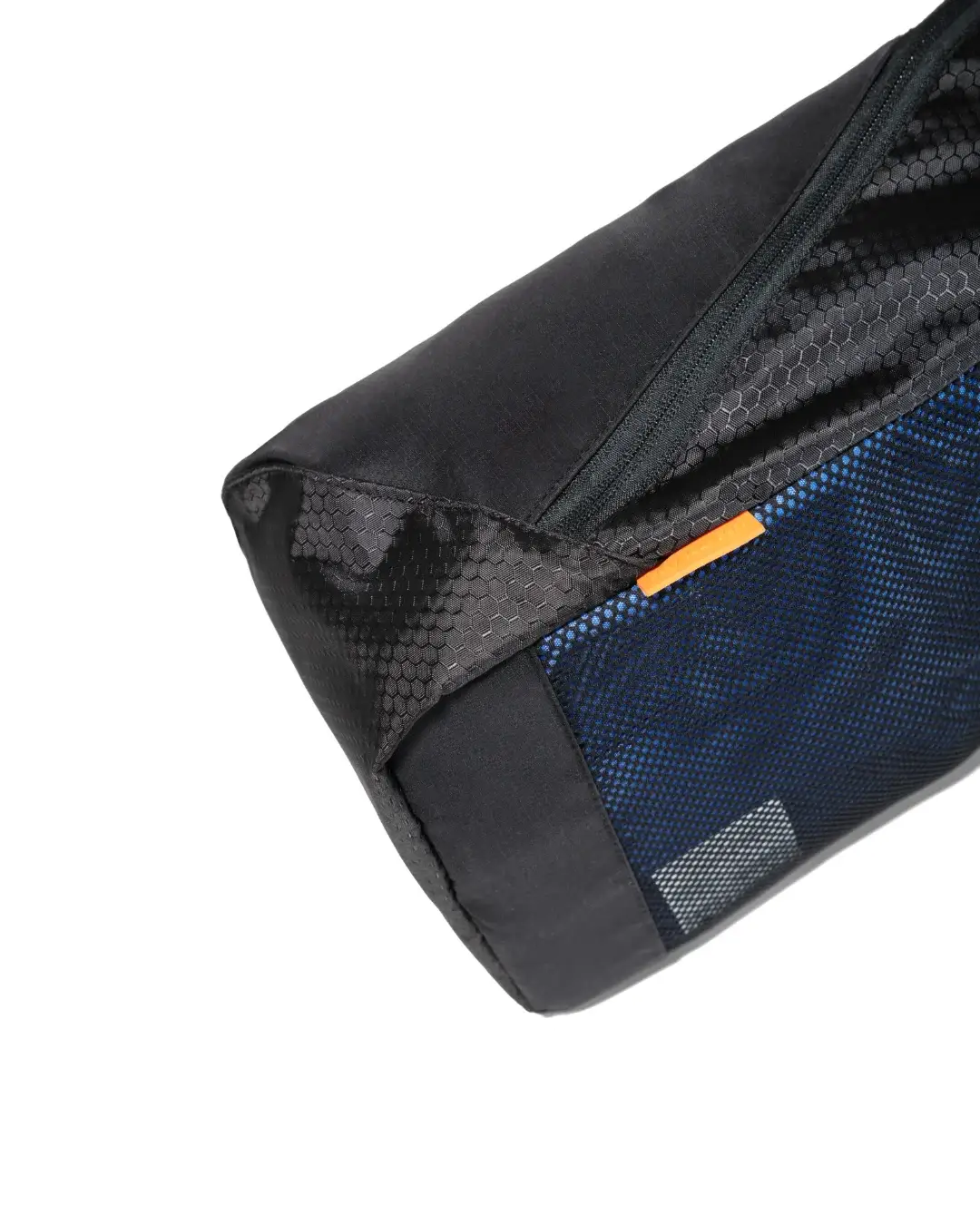 Close-up angled view of black SYMA Cubic highlighting its durable hexagonal ripstop fabric texture, precise stitching, and orange accent tag. Ventilated travel shoe bag.