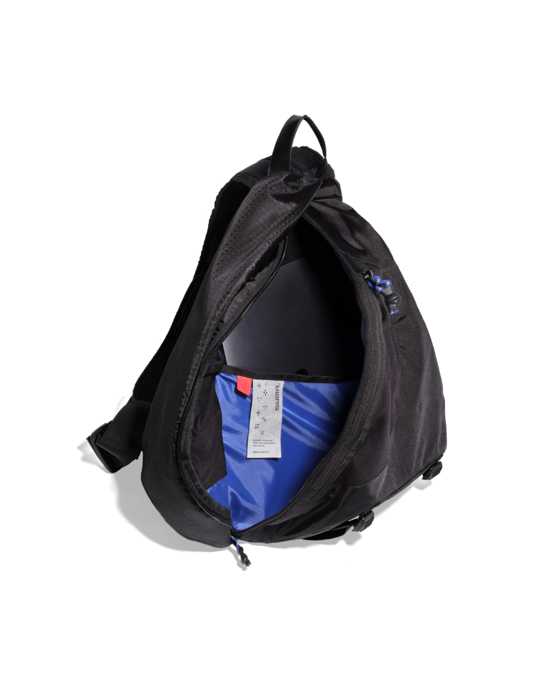 High-angle open interior view of the black SYMA Symmetry Crossbody Bag highlighting its spacious main compartment, high-contrast blue lining, and internal device sleeve. Large techwear crossbody bag.