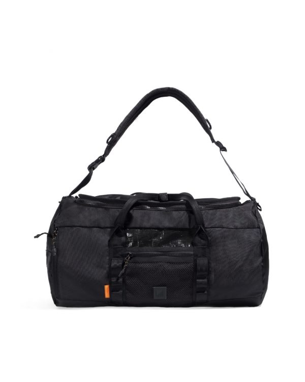 Front view of black SYMA Wonder Duffle Bag highlighting padded shoulder strap, grab handles, and front mesh pocket. Versatile weekend duffle bag