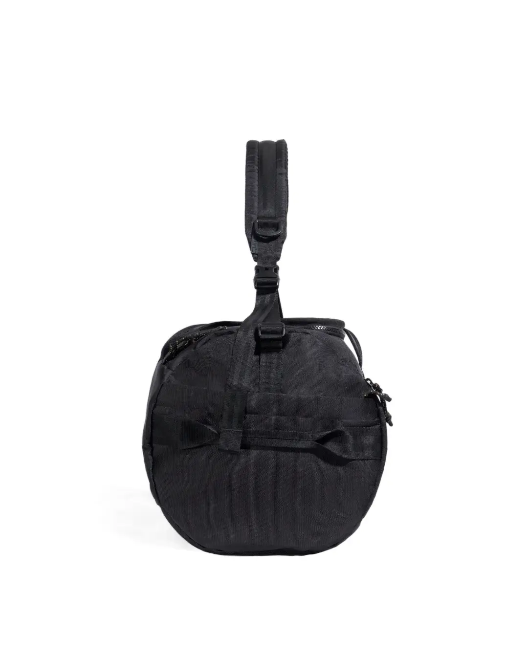 Side profile view of black SYMA Wonder Duffle Bag highlighting side grab handle and sturdy cylindrical shape. Versatile weekend duffle bag.