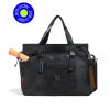 SYMA. Miles Racket-Tote Black worn by man carrying racket. Premium urban utility padel & tennis bag
