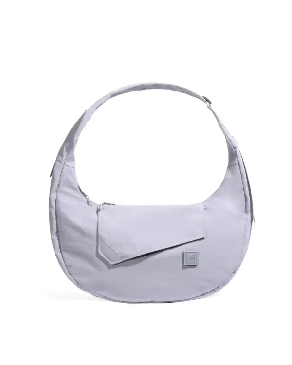 Front view of SYMA Fable Sling Bag Light Grey showing silent magnetic flap. Minimalist tech messenger