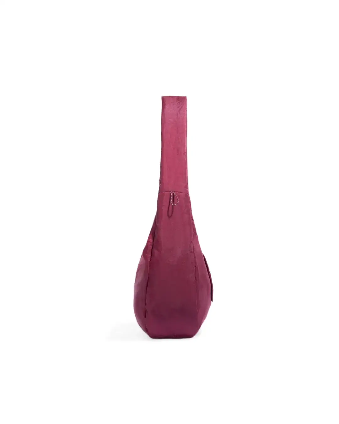 Side profile view of SYMA Fable Sling Bag Maroon showing slim silhouette. Urban streetwear sling bag