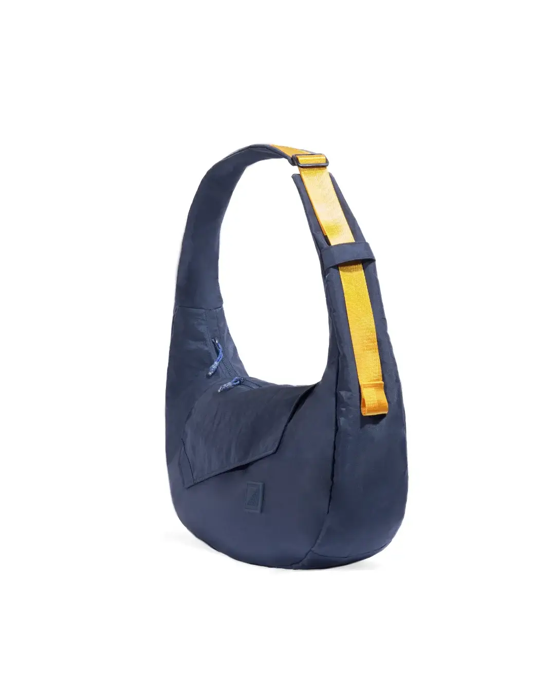 Right angled view of SYMA Fable Sling Bag Navy highlighting contrast yellow strap and curved silhouette. Everyday commuter sling bag