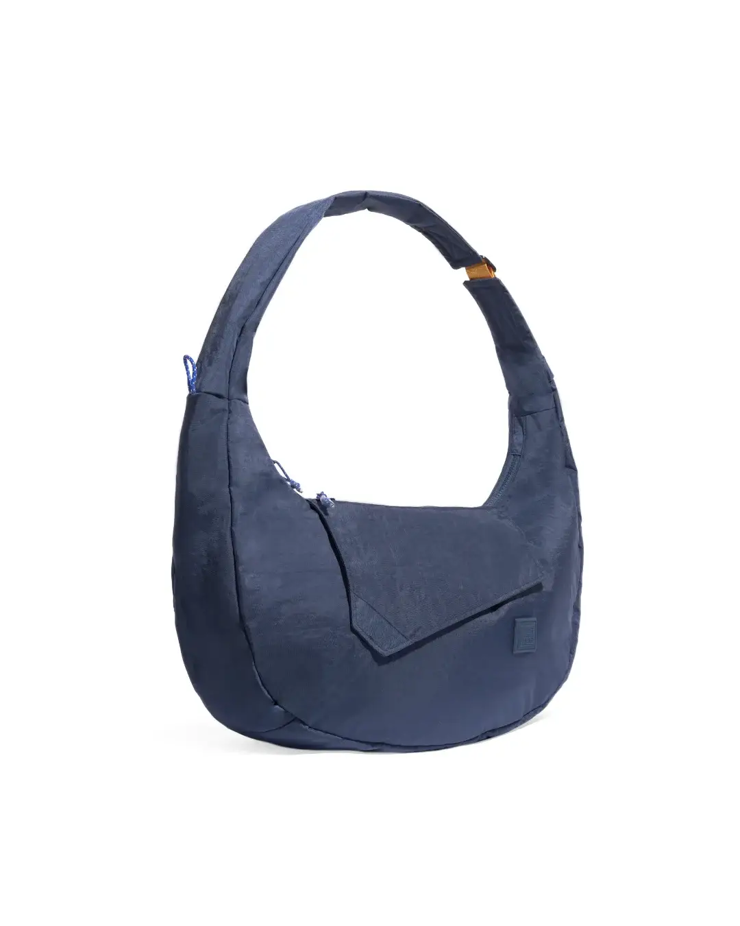 Left angled view of SYMA Fable Sling Bag Navy highlighting clean front flap structure. Everyday commuter sling bag