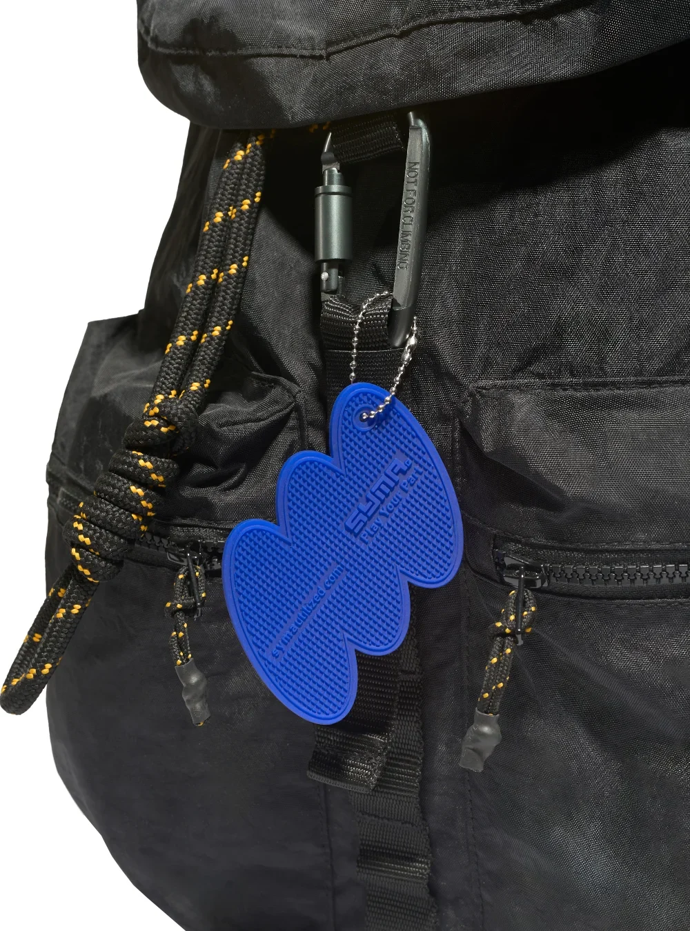 Alternative view of SYMA. Rubber Hang Tag